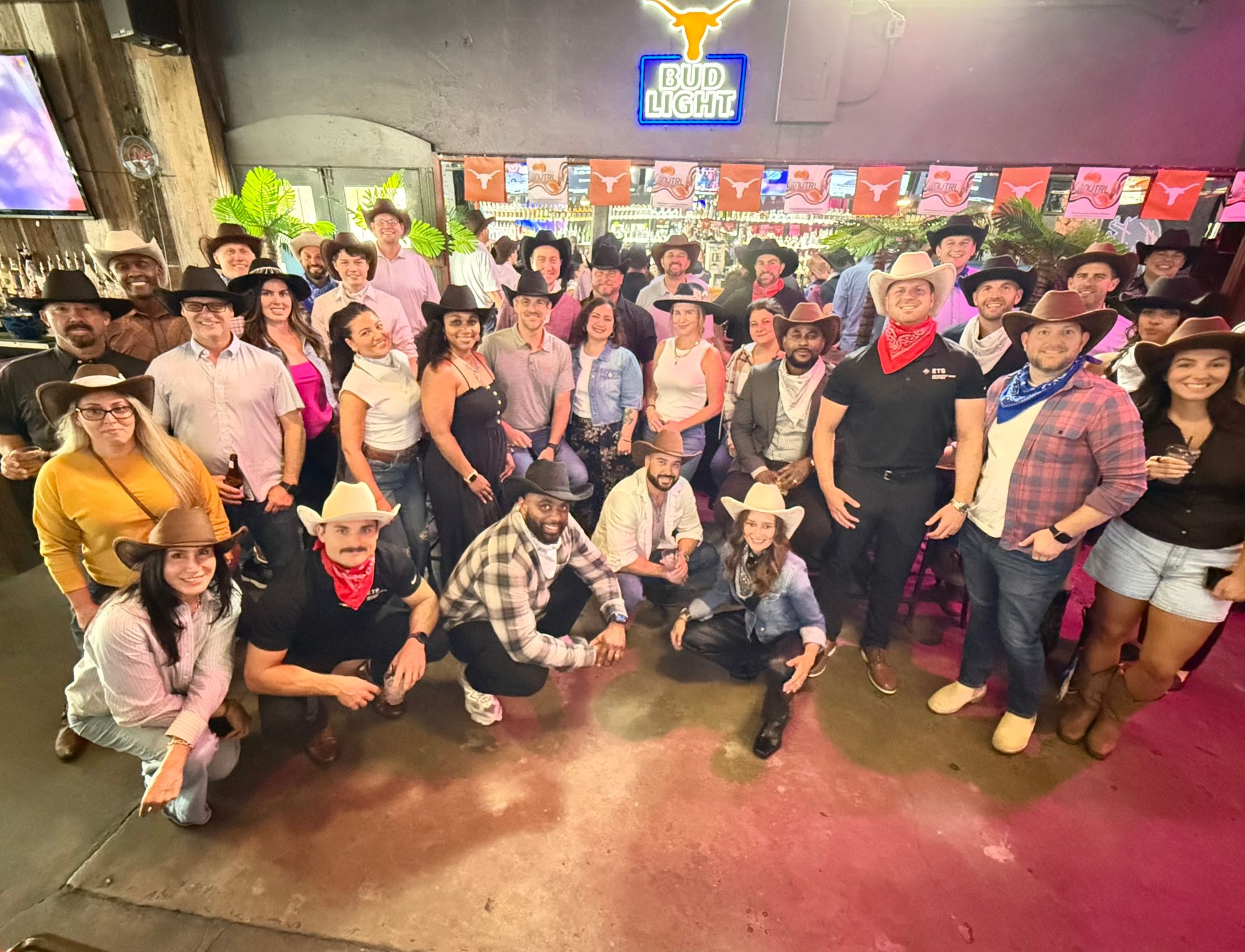 Group in custom hats at event